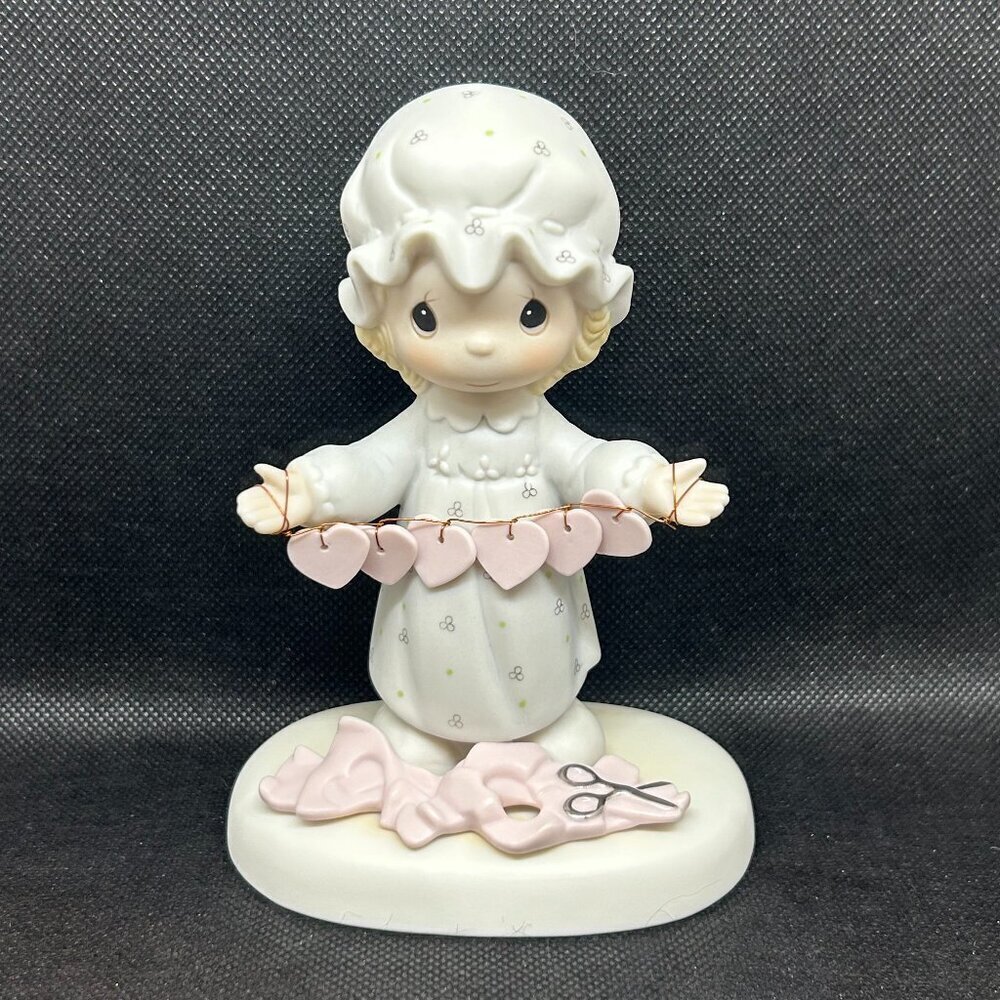 Precious Moments "You have touched so many hearts" figurine